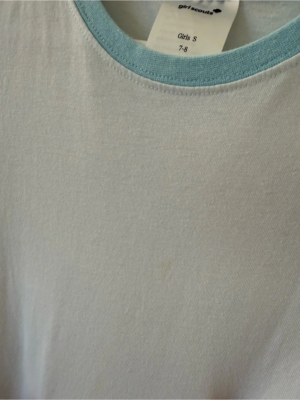 Brownie Girl Scouts Uniform. Tee shirt with skort and socks